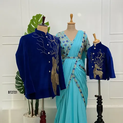Royal blue velvet bandhgalas with gold stag beadwork beside an aqua pre-draped saree